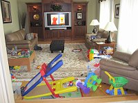  This is what happens when you take down the gate; Patrick pushed all the toys down the step...