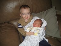  This is my big brother Johnnie holding me for the first time!